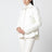 Giacca con zip bianca in tessuto bouclé