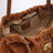 Borsa The Cristina Tote color rame in pelle scamosciata