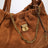 Borsa The Cristina Tote color rame in pelle scamosciata