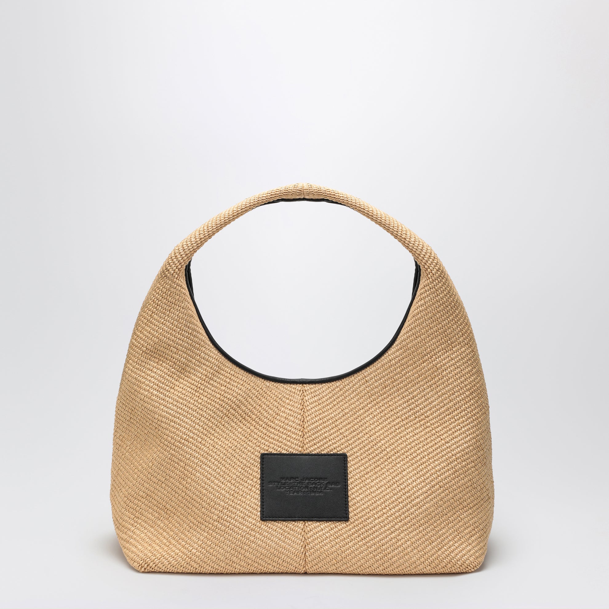 The Woven mini bag in woven fabric
