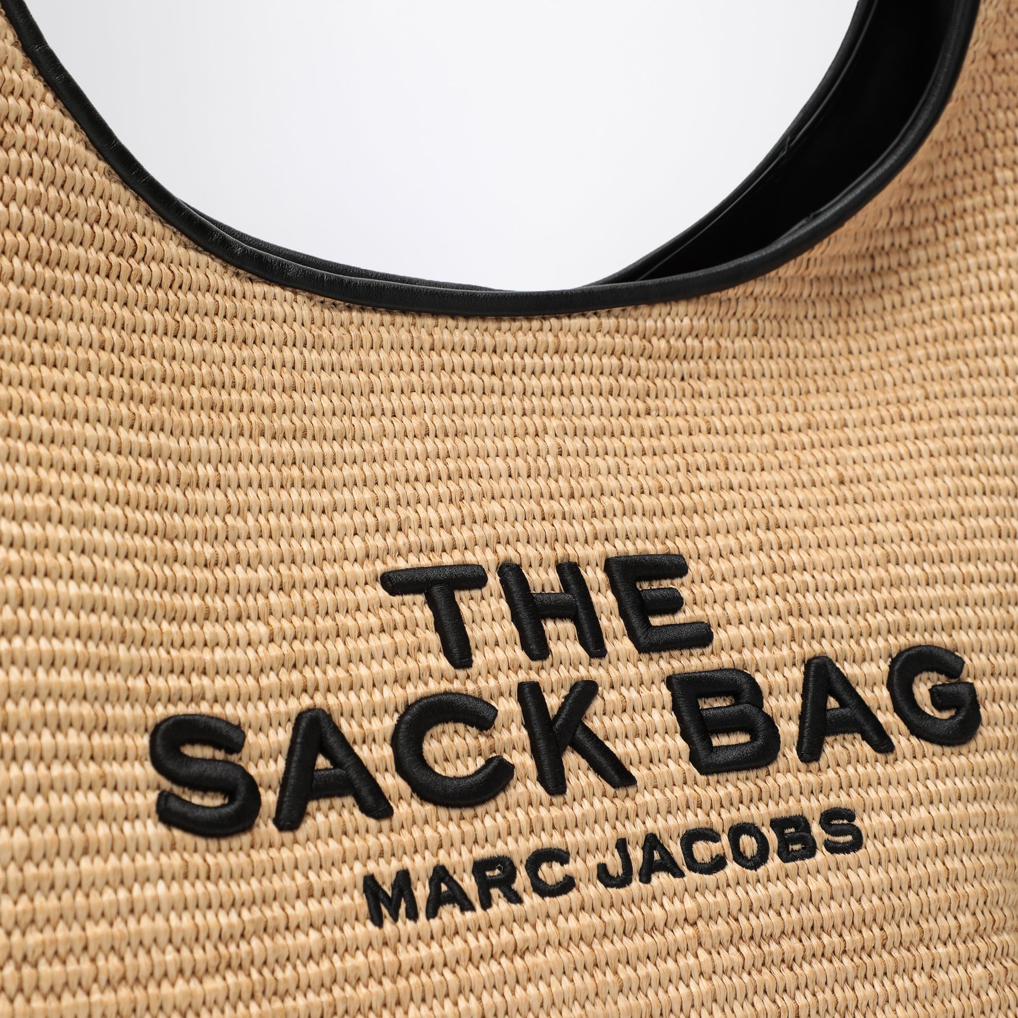The Woven mini bag in woven fabric