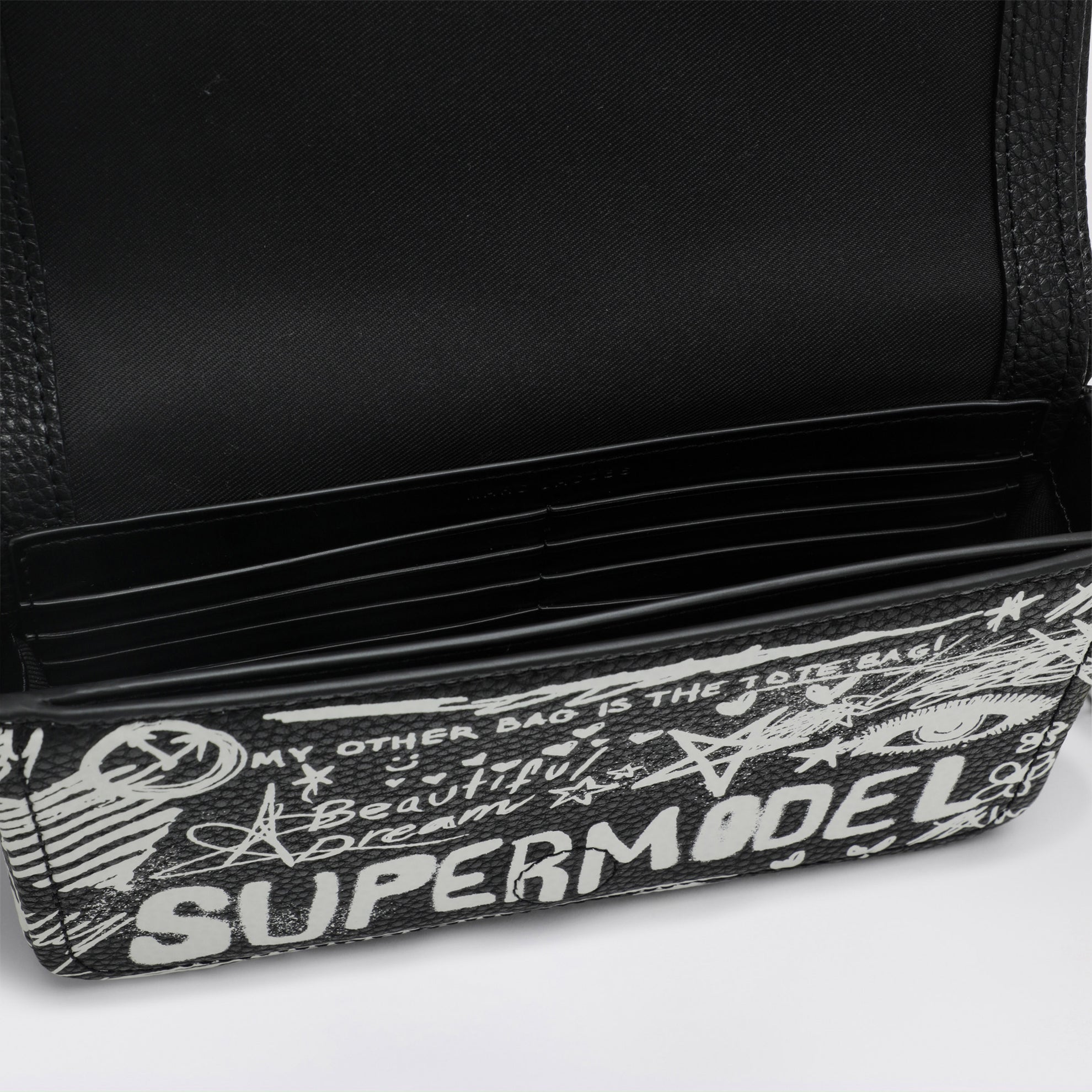 Mini-Schultertasche schwarz mit Punk-Schriftzug