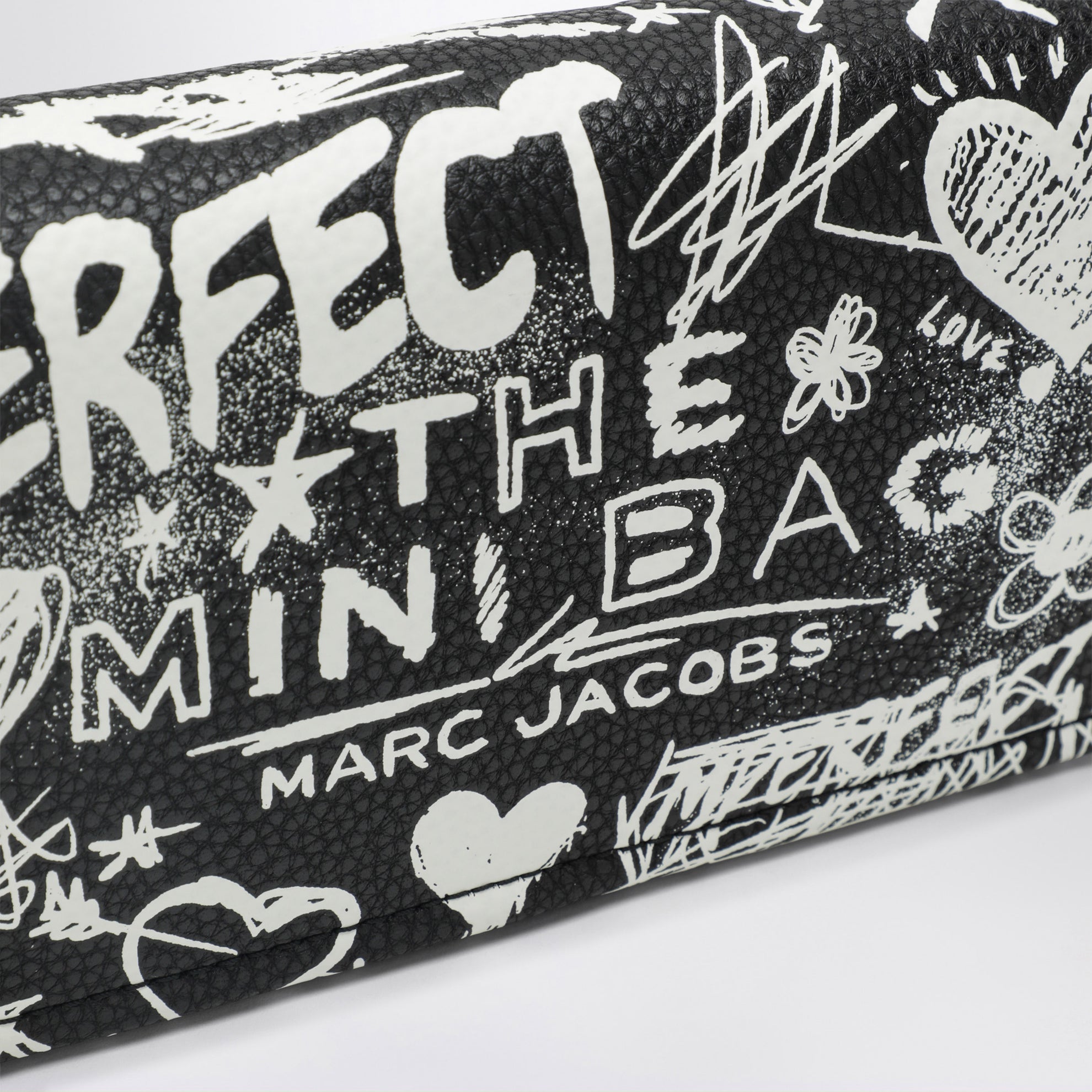 Mini-Schultertasche schwarz mit Punk-Schriftzug