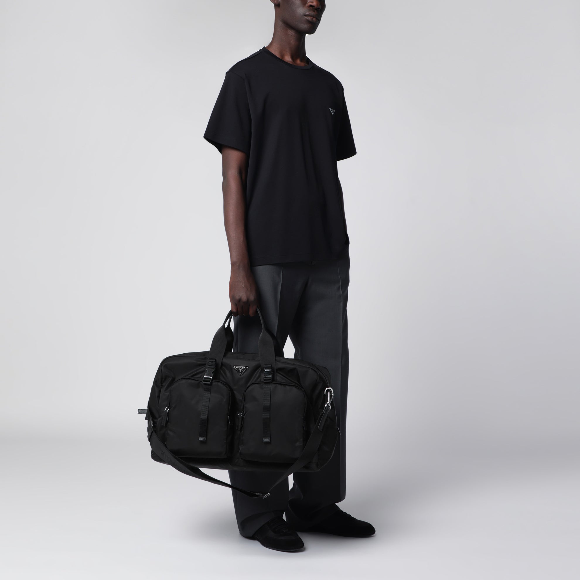 Schwarze Reisetasche aus Re-Nylon und Saffiano-Leder