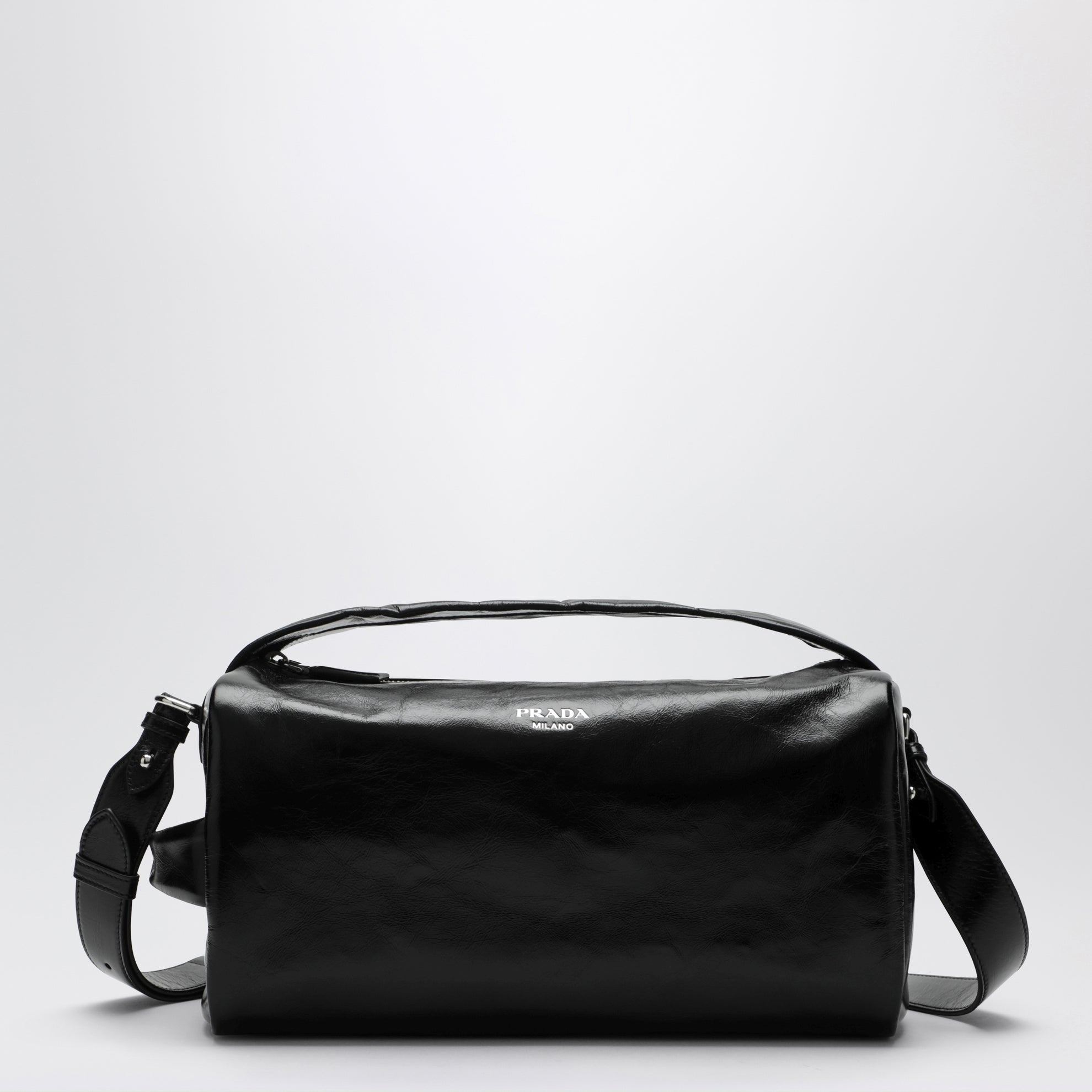 Black leather bag with glossy finish