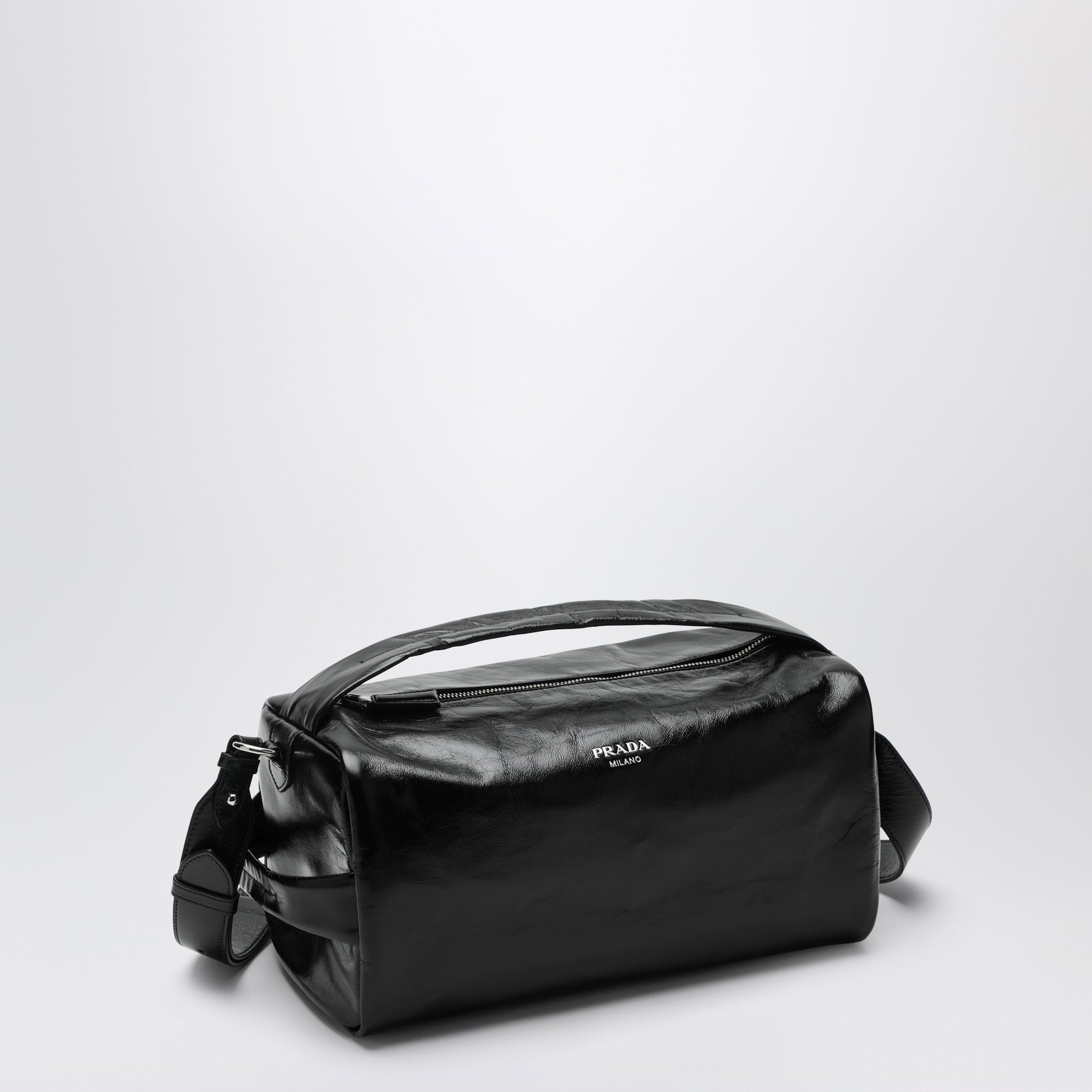 Black leather bag with glossy finish