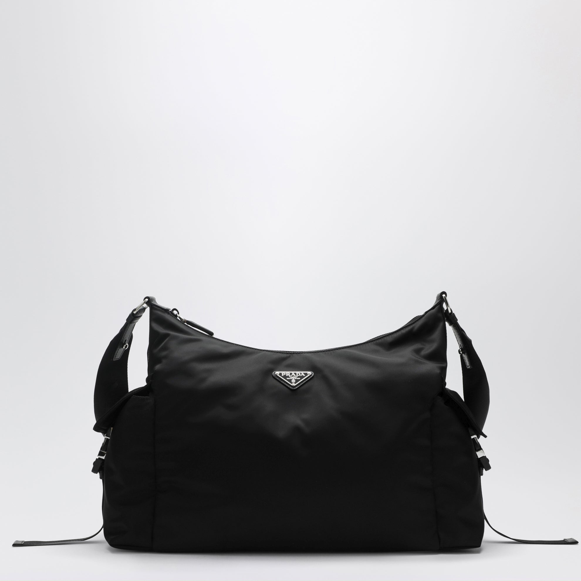 Black Prada Explore bag in Re-Nylon and leather by Prada