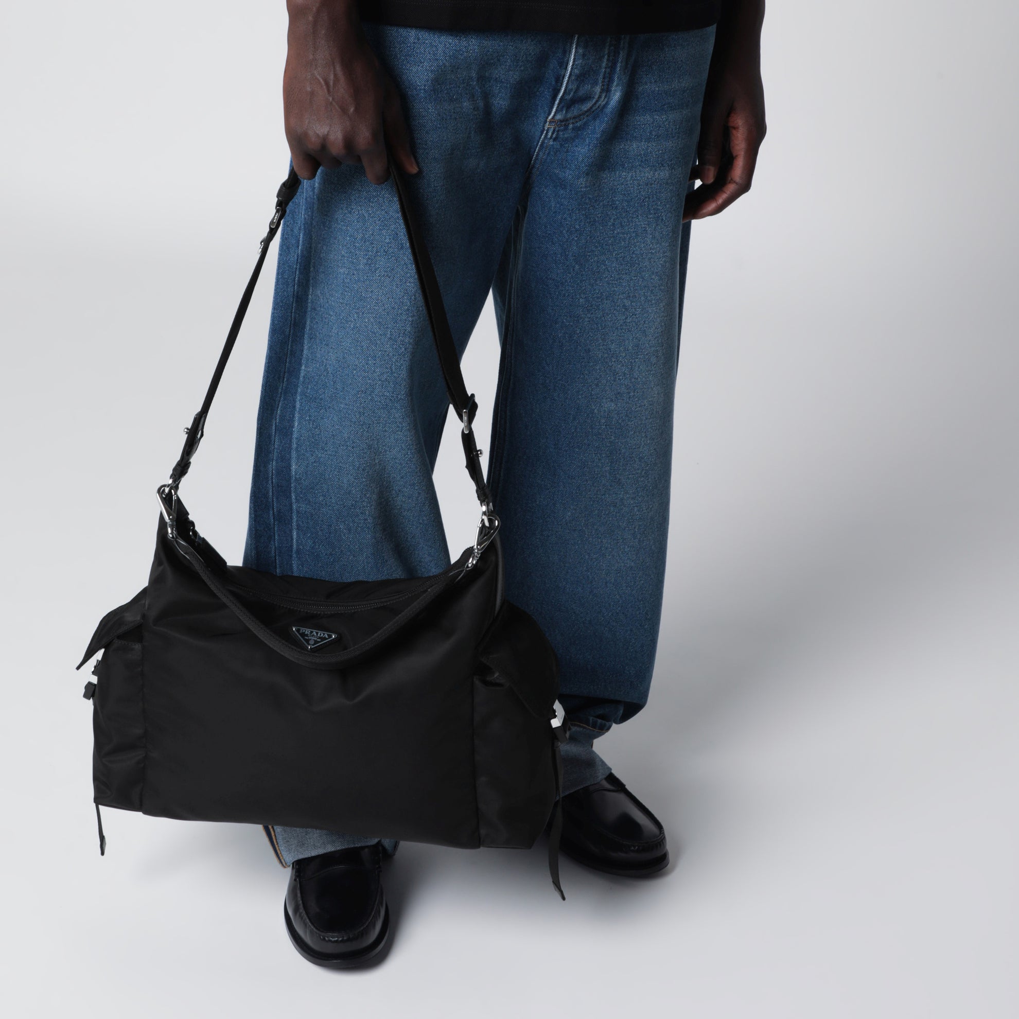 Black Prada Explore bag in Re-Nylon and leather by Prada