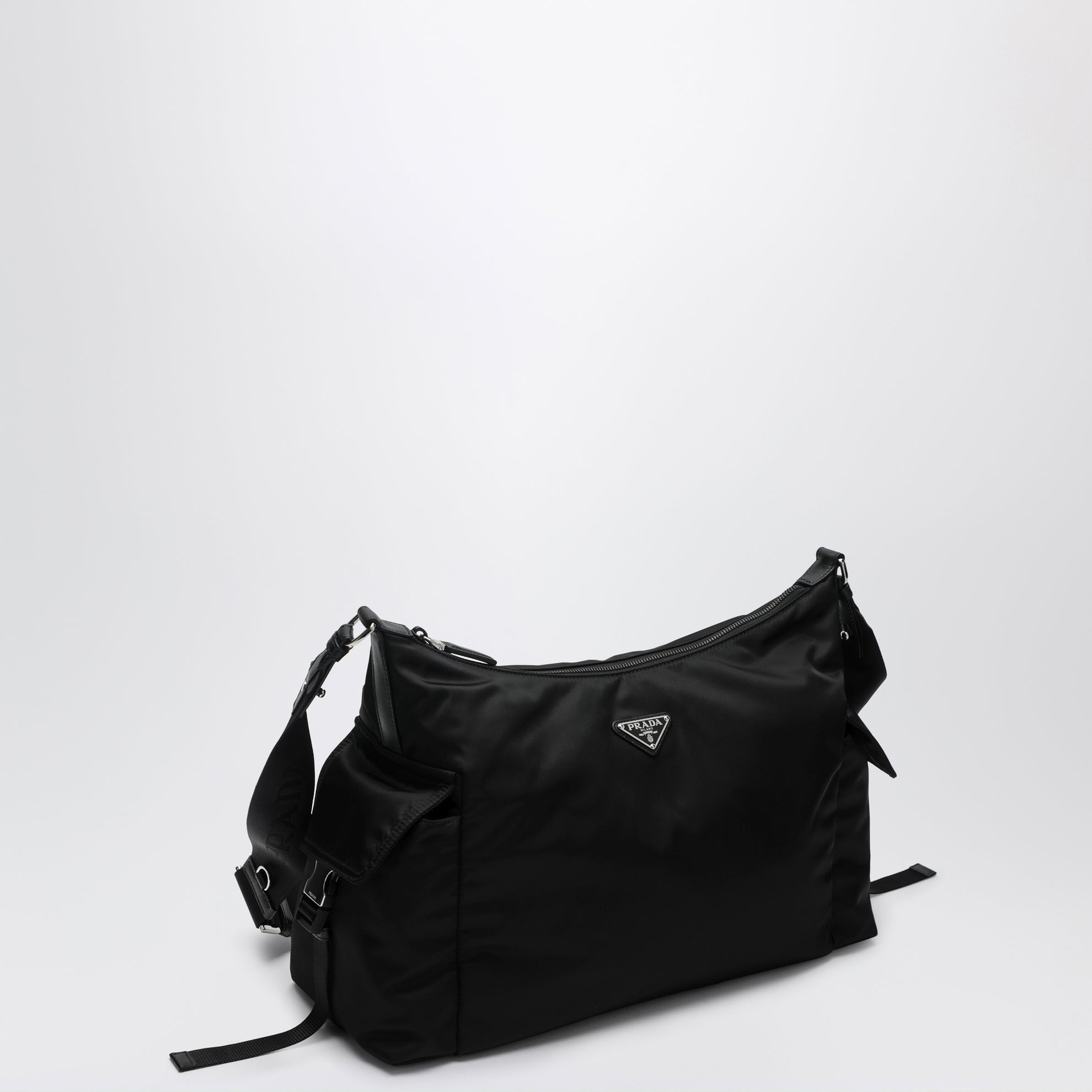 Black Prada Explore bag in Re-Nylon and leather by Prada