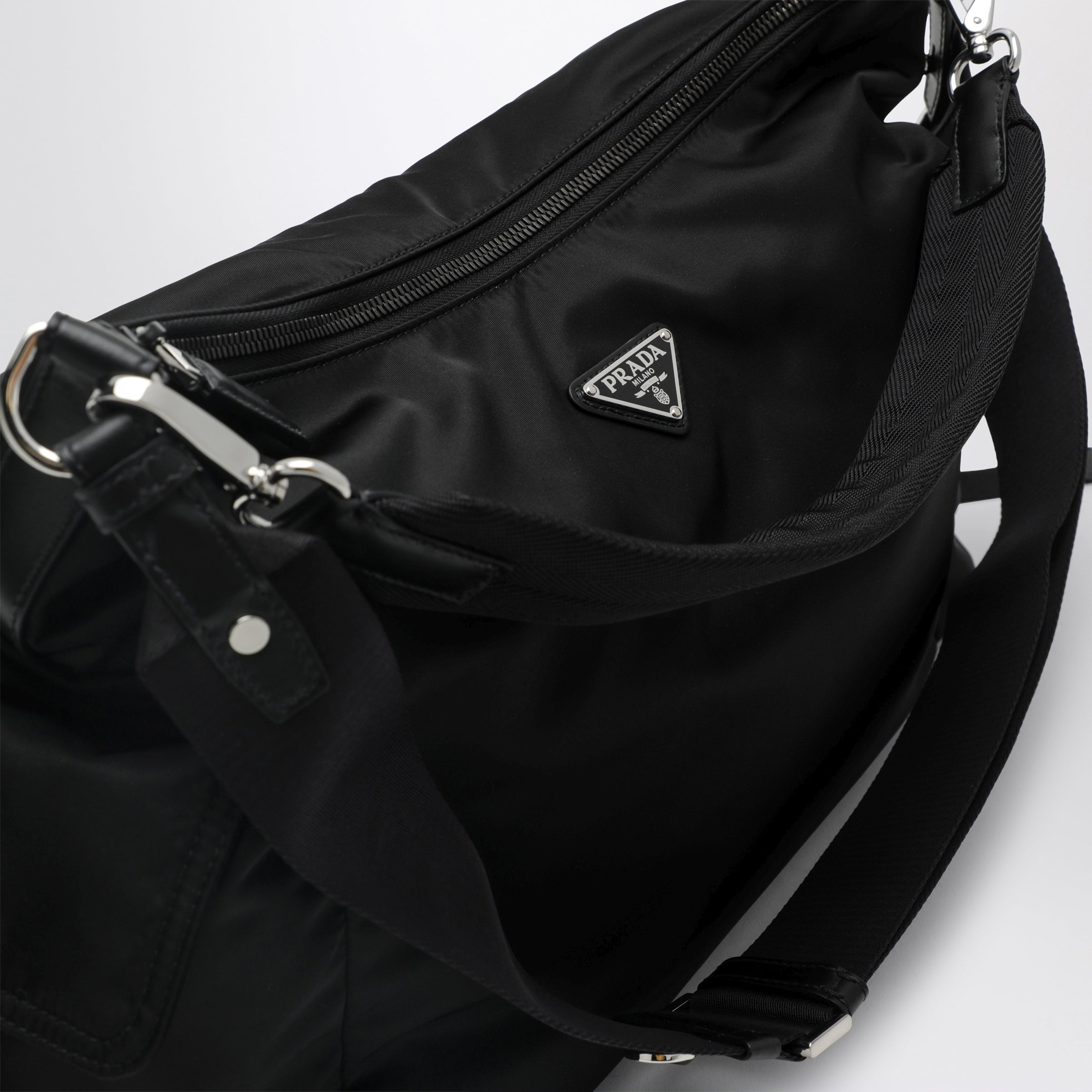 Prada Black Prada Explore bag in Re-Nylon and leather by Prada
