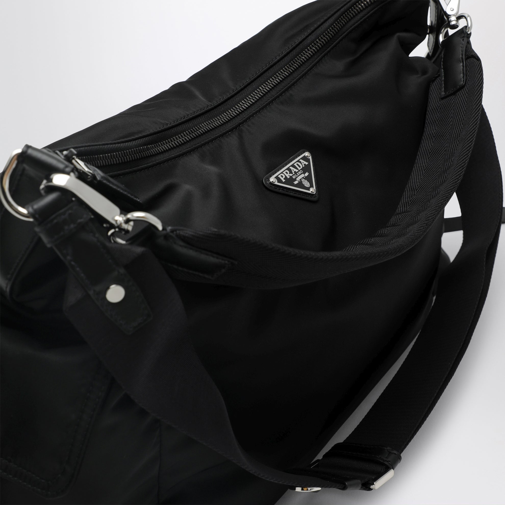 Black Prada Explore bag in Re-Nylon and leather by Prada
