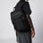 Black Re-Nylon backpack with snap fastener