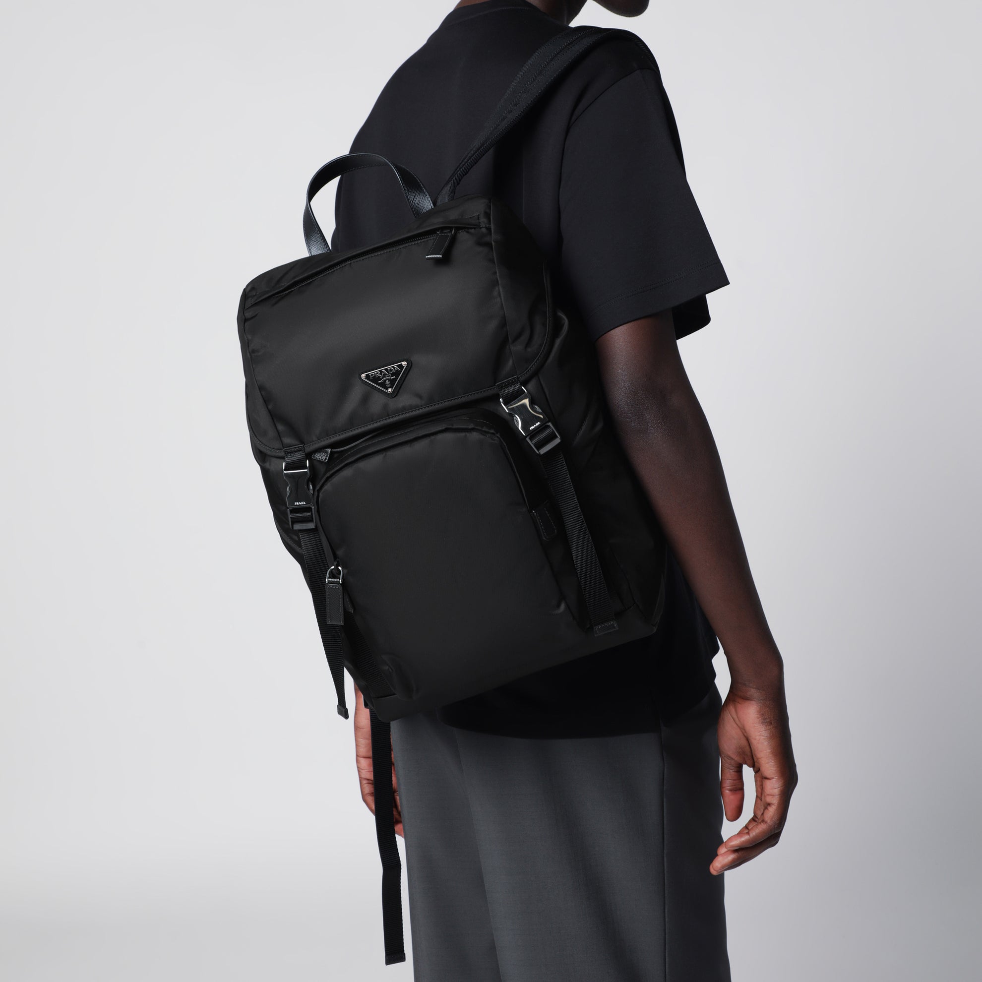 Black Re-Nylon backpack with snap fastener