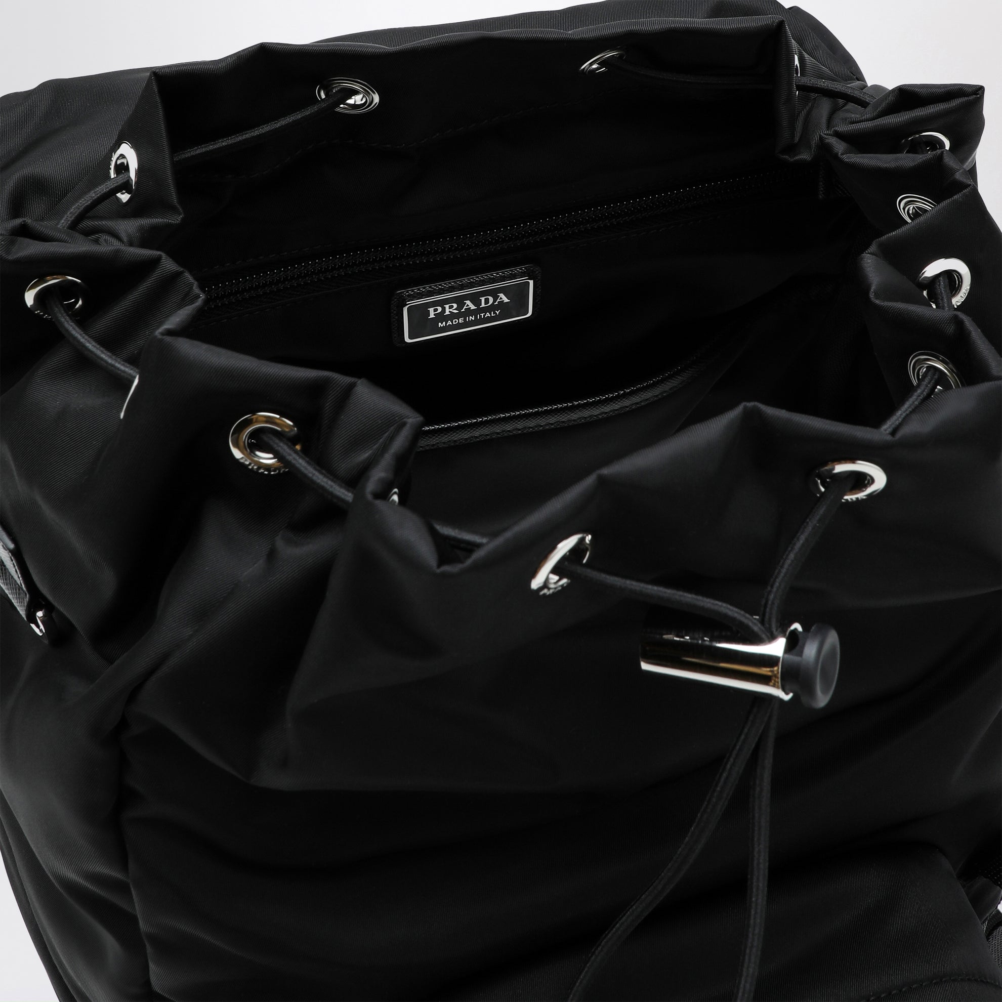 Black Re-Nylon backpack with snap fastener