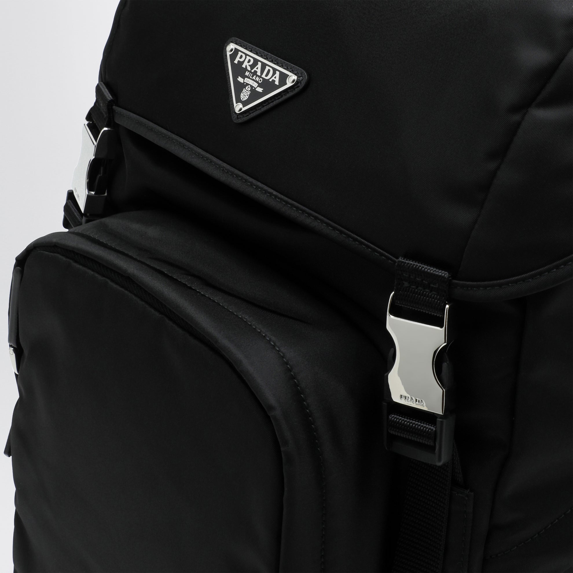 Black Re-Nylon backpack with snap fastener