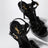 Sandali Tribute con plateau in pelle verniciata nera