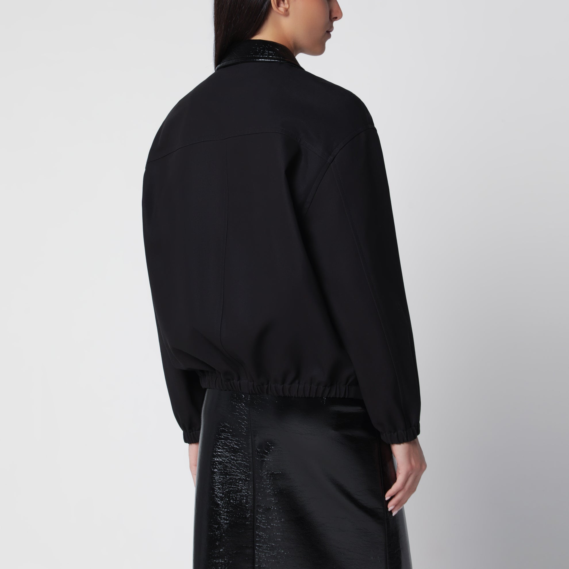 Giacca bomber nera in cotone con collo in vinile