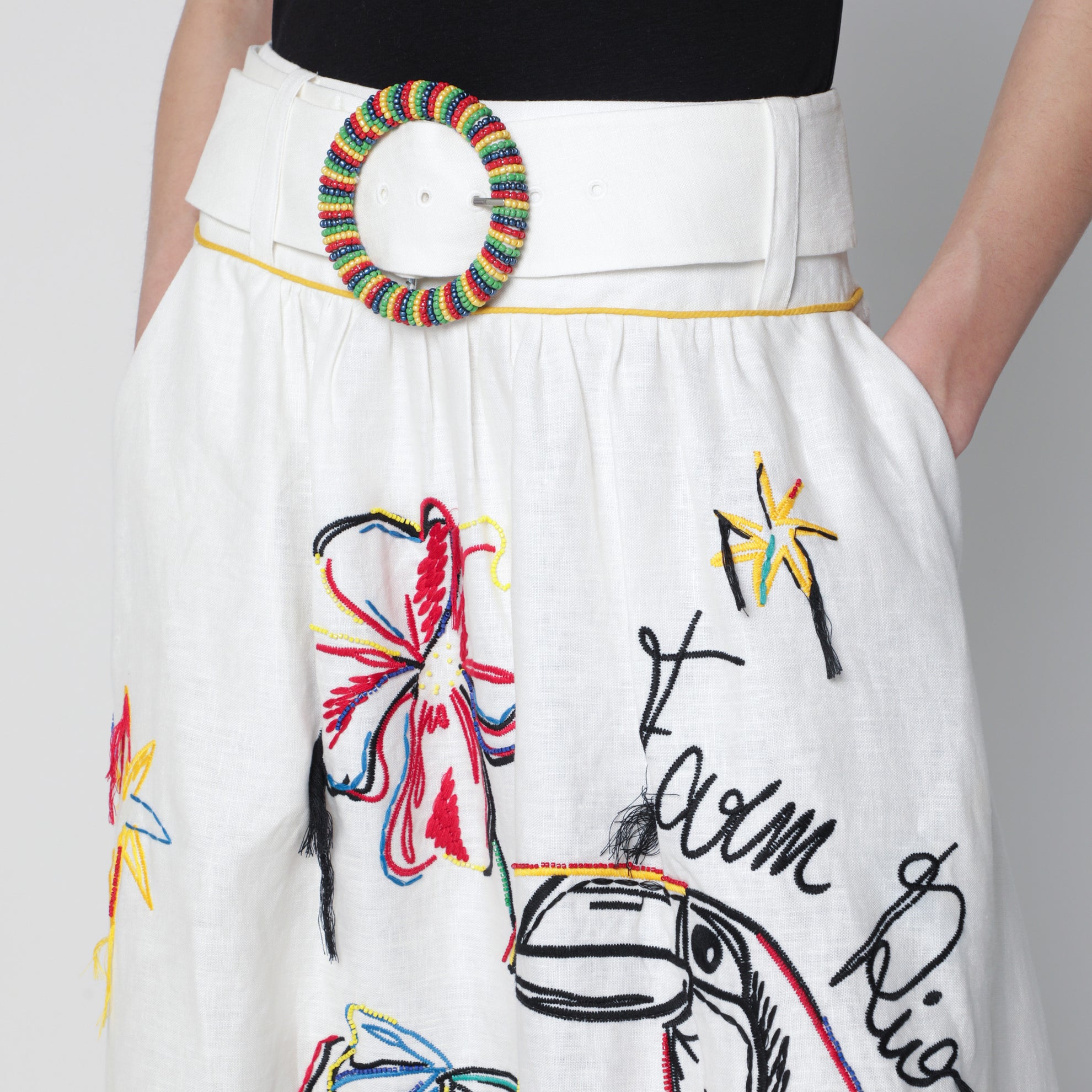 White linen skirt with tropical embroidery
