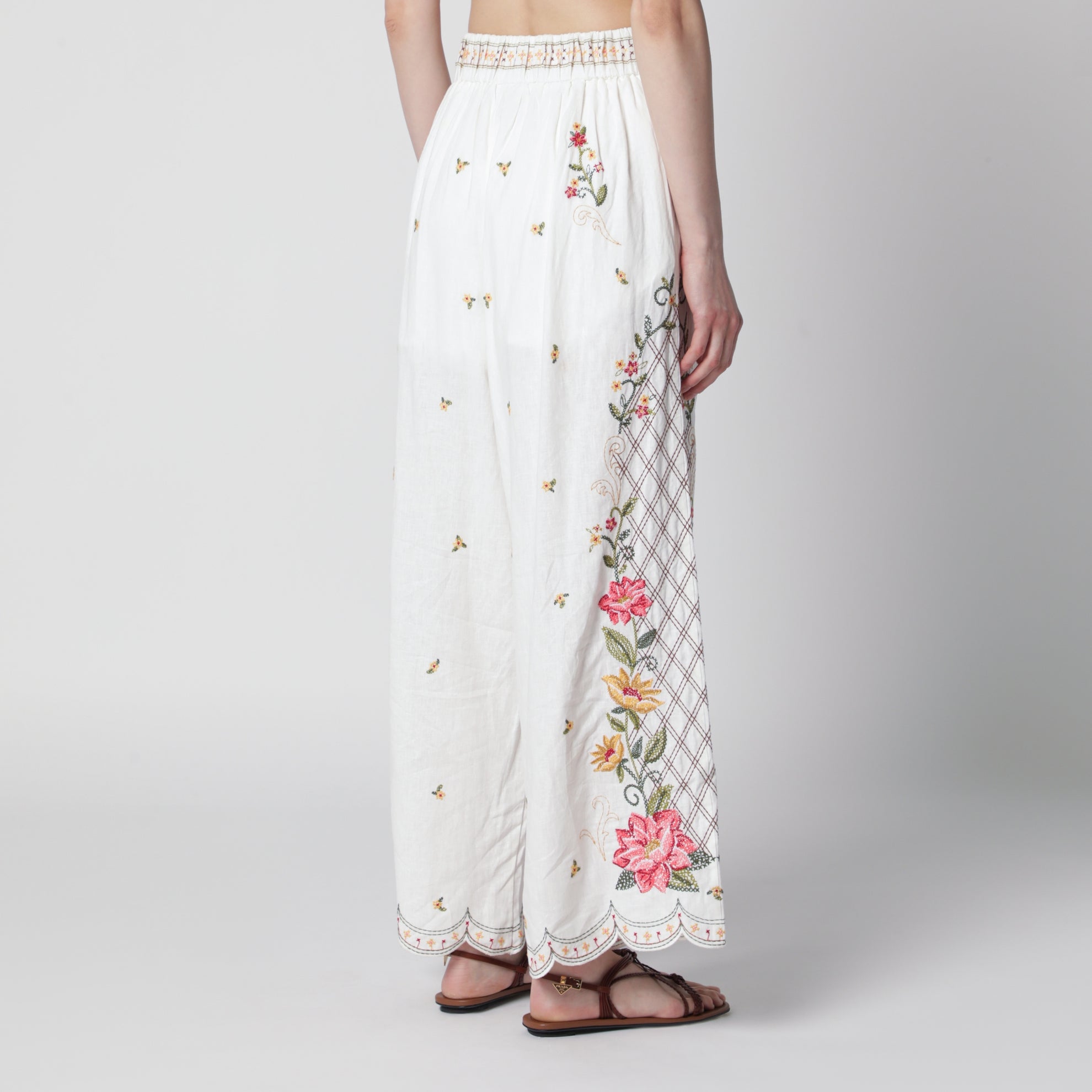 Pantaloni in misto lino con ricamo floreale