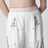 Pantaloni in misto lino con ricamo floreale