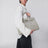 Graue Tasche aus recyceltem Vintage-Carhartt-Stoff