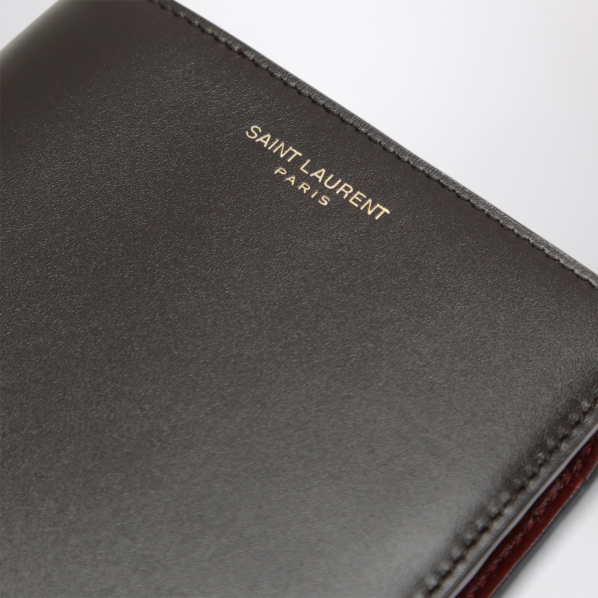 East/West brown and burgundy leather wallet