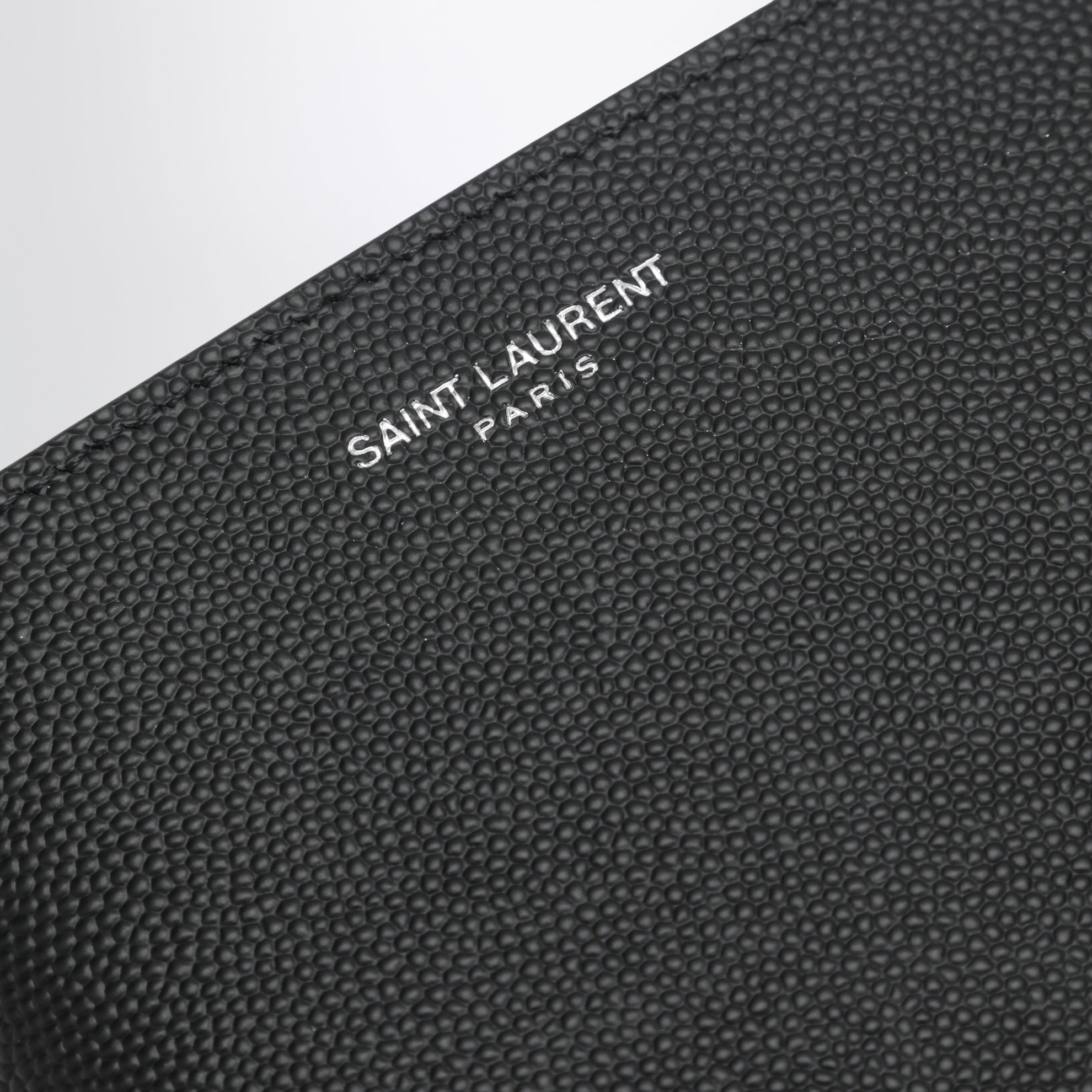 Black East/West wallet in grain de poudre leather