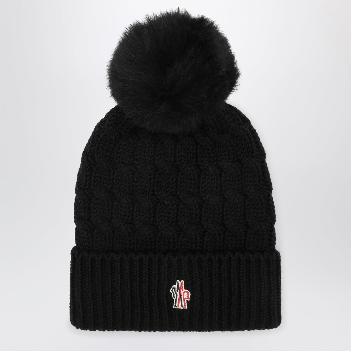 Bonnet noir en laine avec pompon