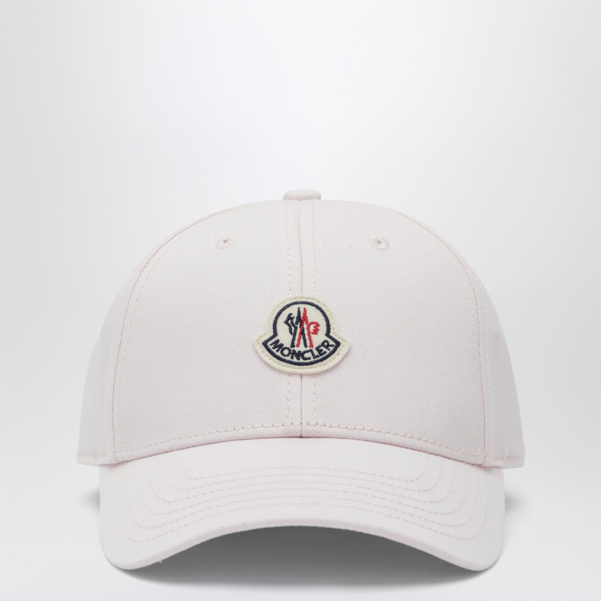 Pink baseball cap with logo patch