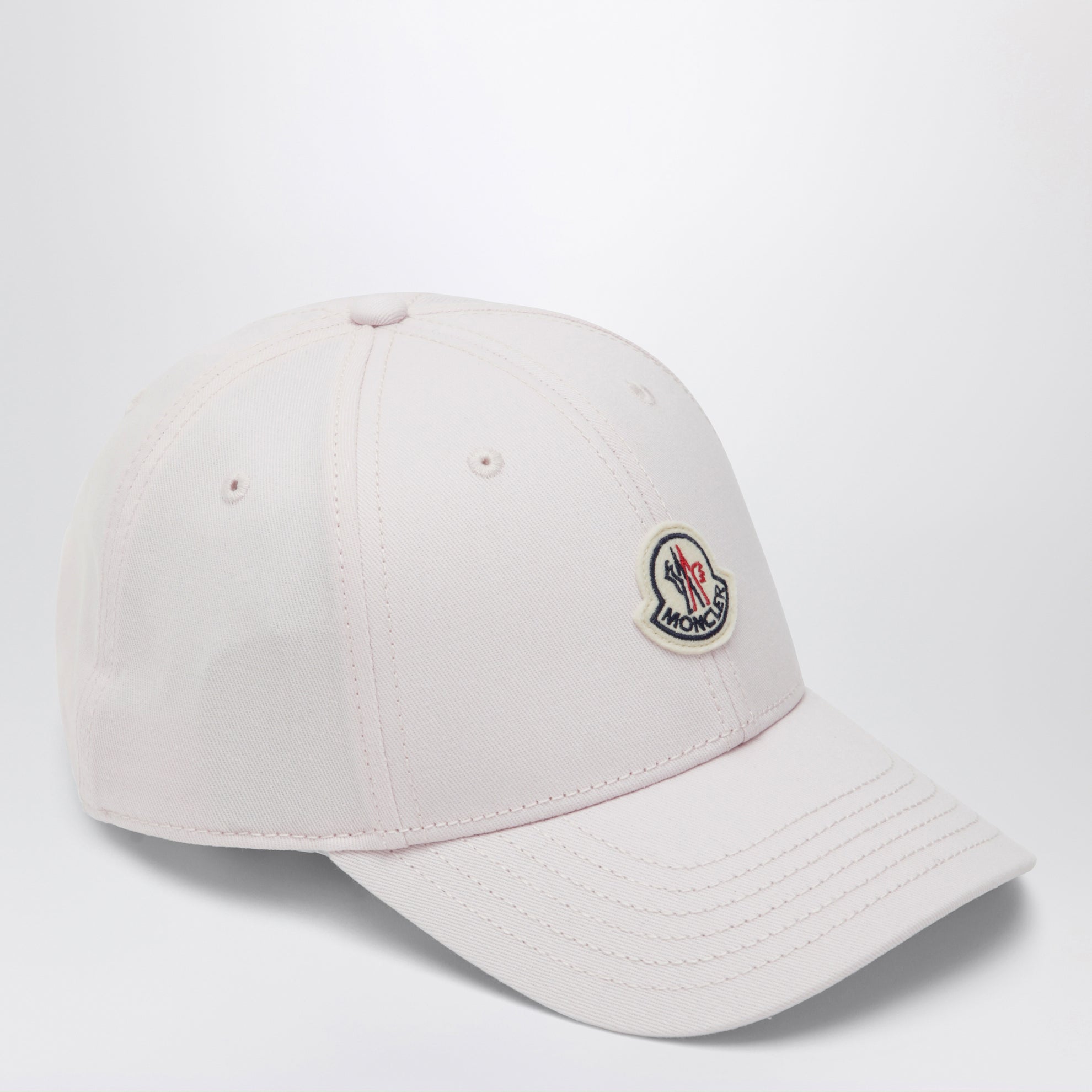 Pink baseball cap with logo patch