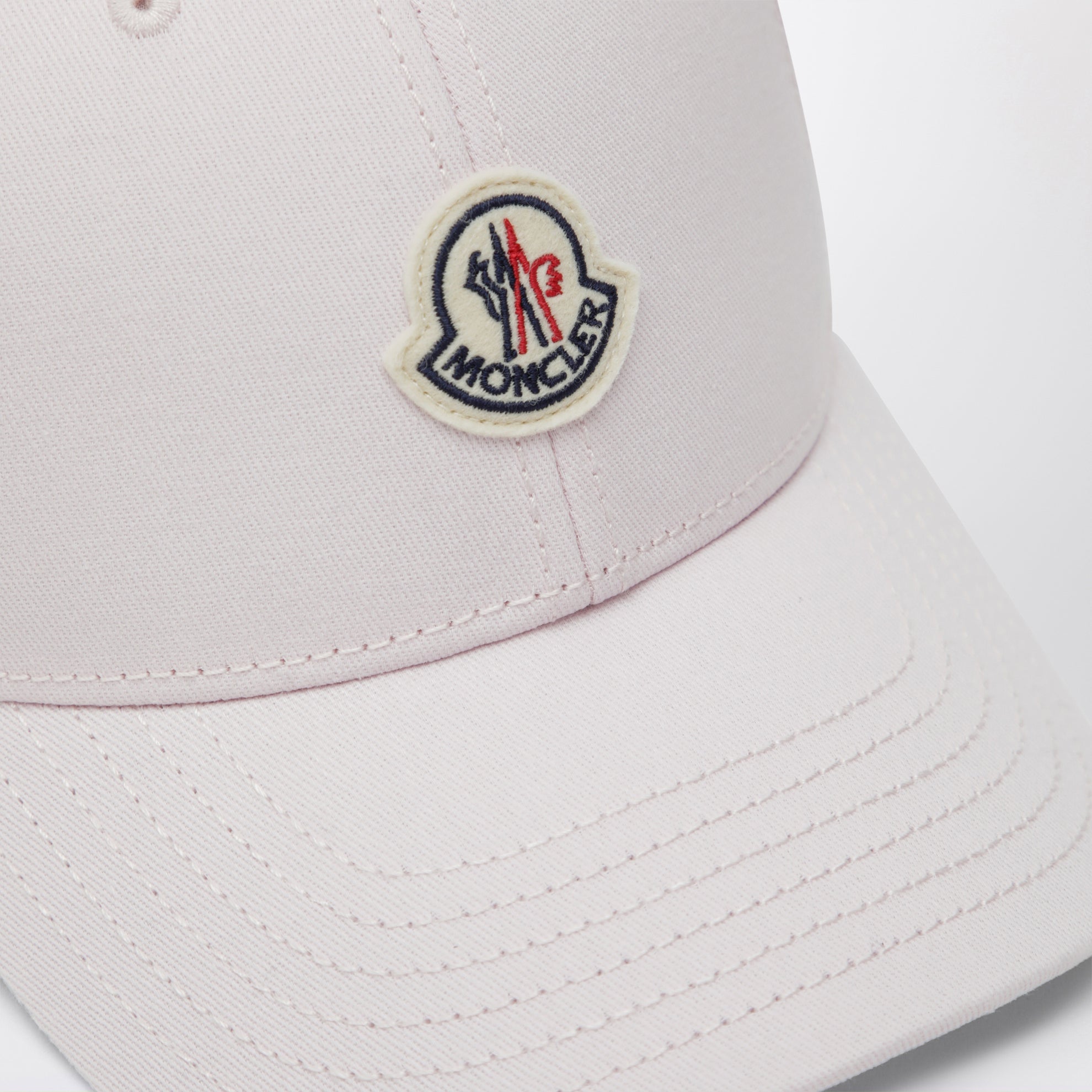 Pink baseball cap with logo patch