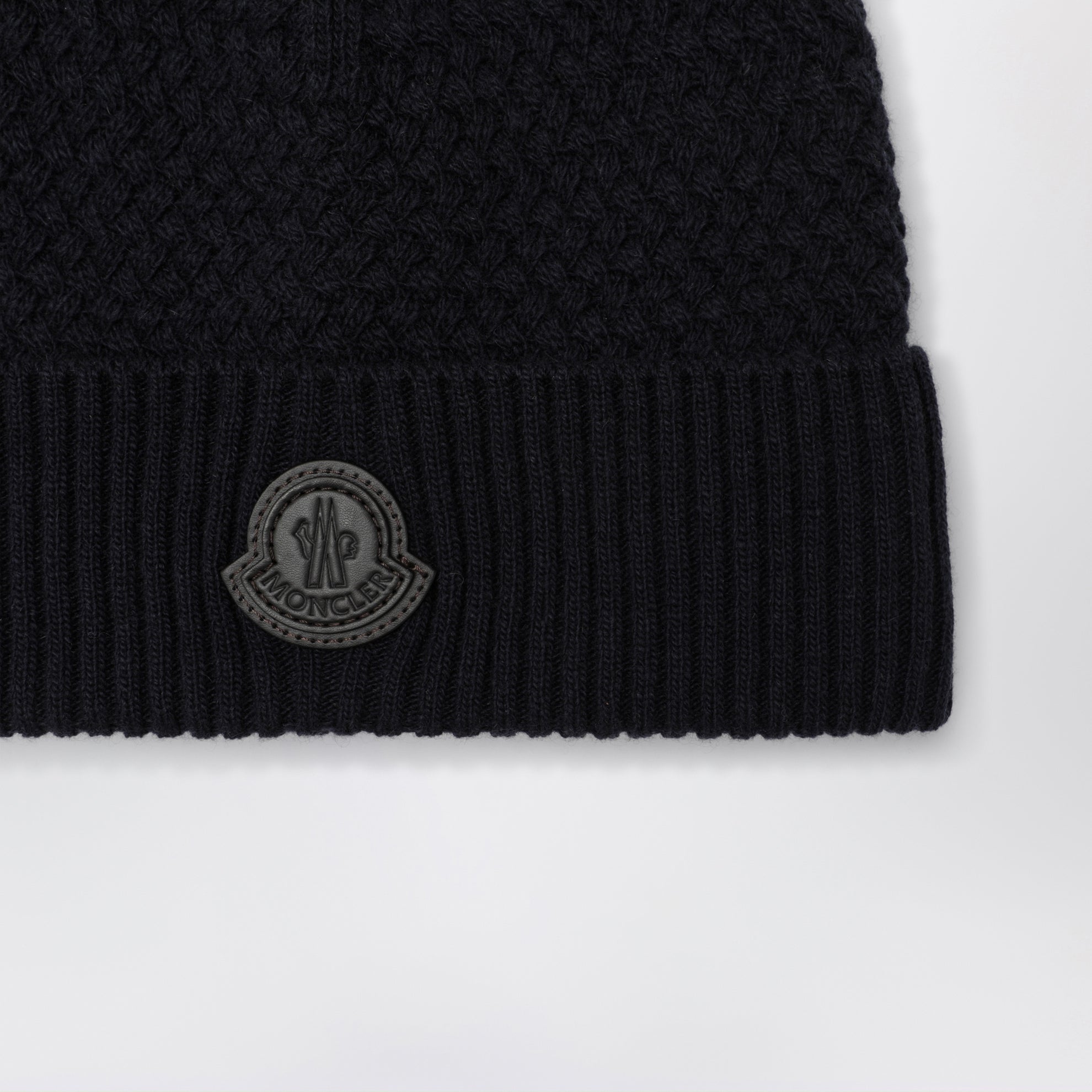 Navy blue wool beanie with logo patch