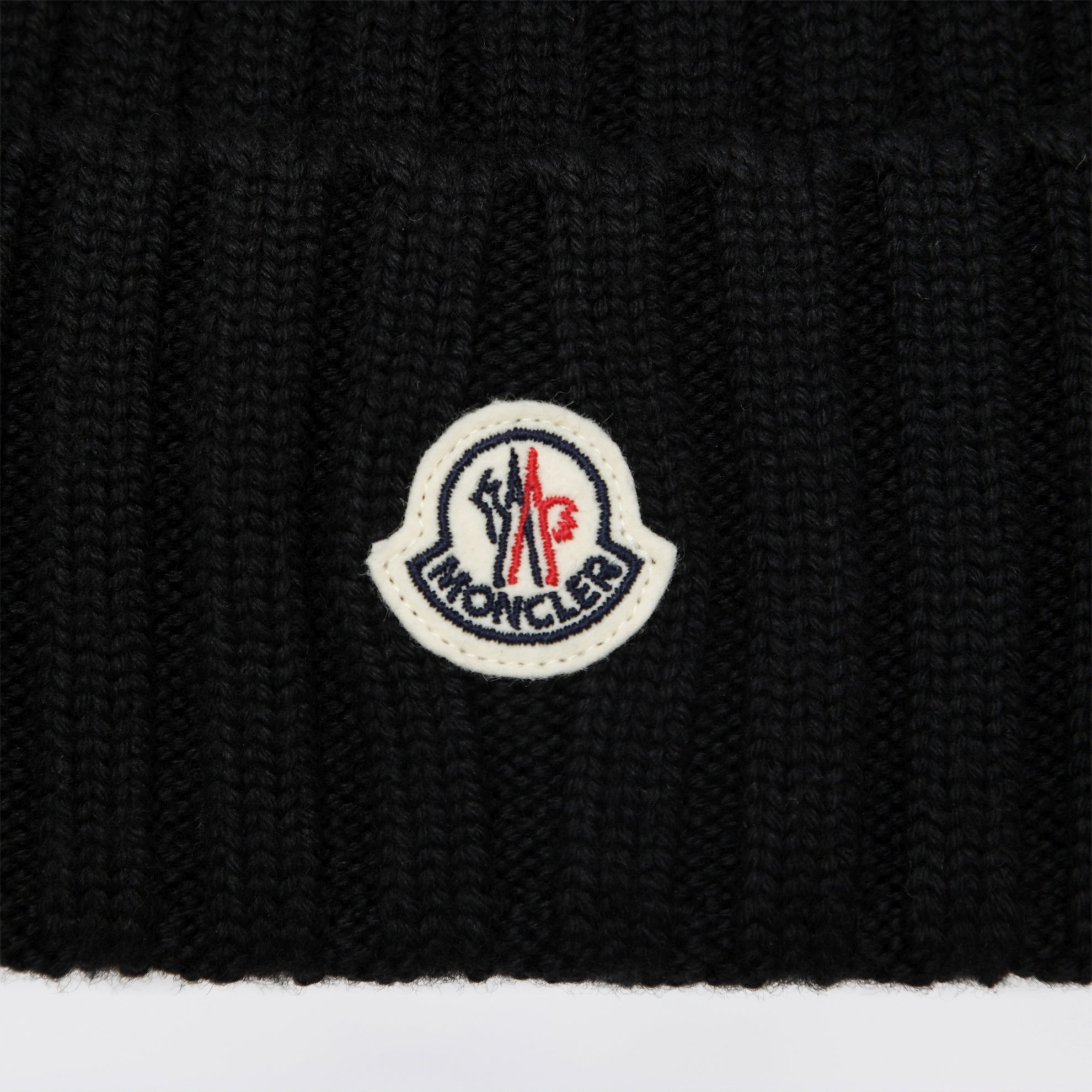 Black cable-knit wool beanie with logo