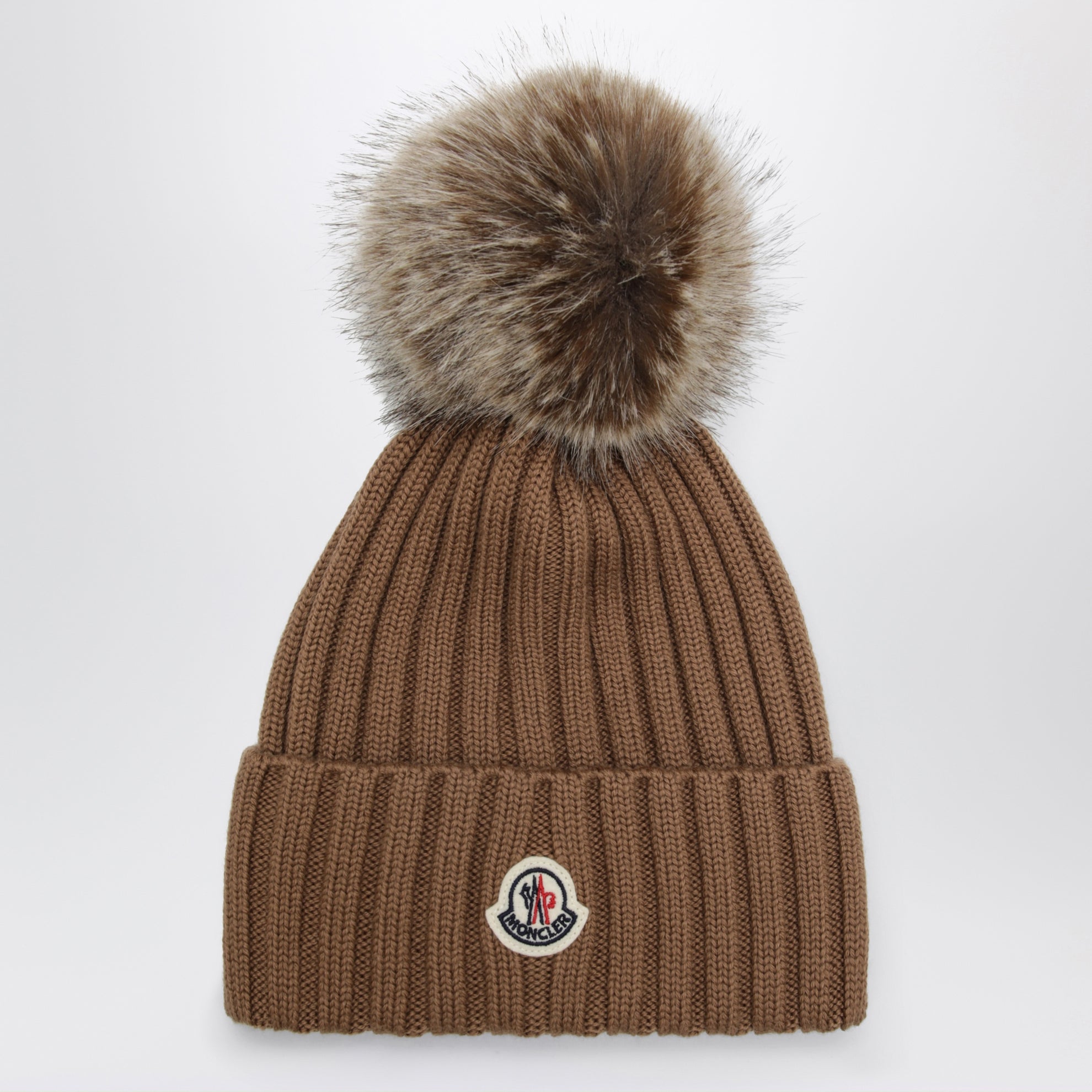 Beige Wollmütze mit Bommel