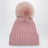 Bonnet rose en laine avec pompon