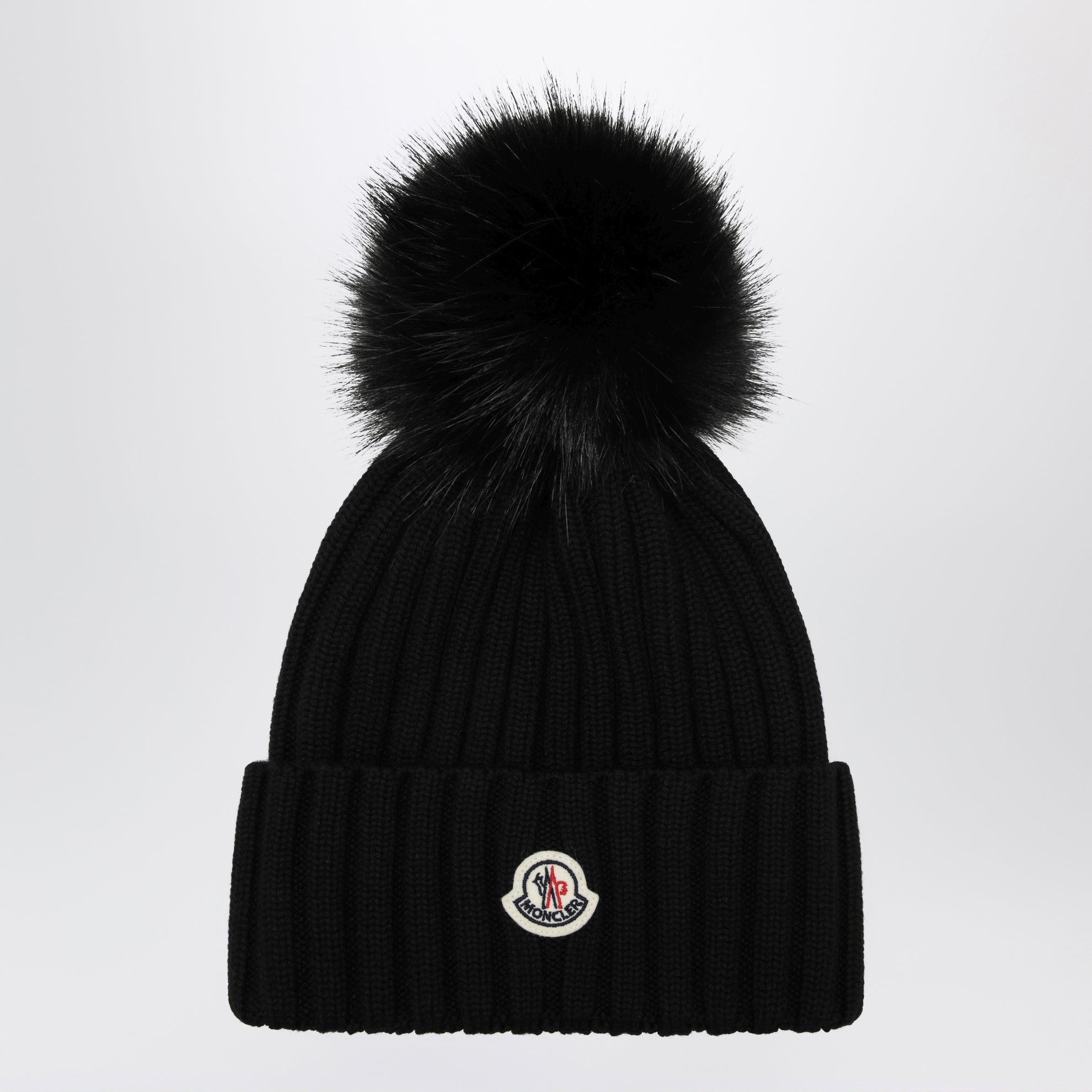 Bonnet noir en laine avec pompon