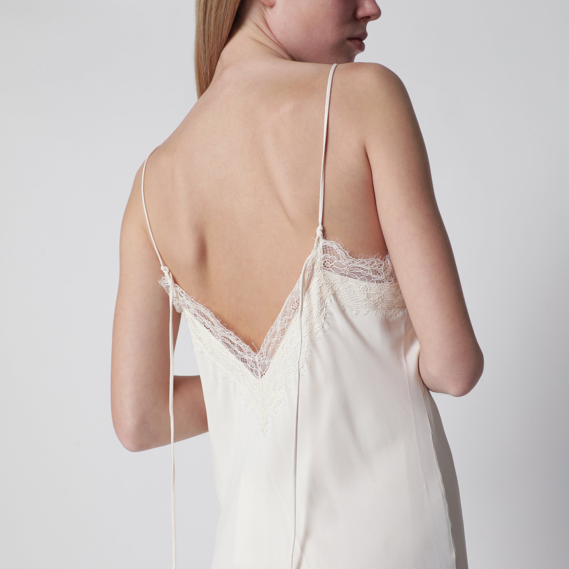 White silk and lace slip dress