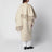 Cape coat with fringes in butter-coloured wool