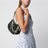 Black Charm bag in croc-effect patent leather