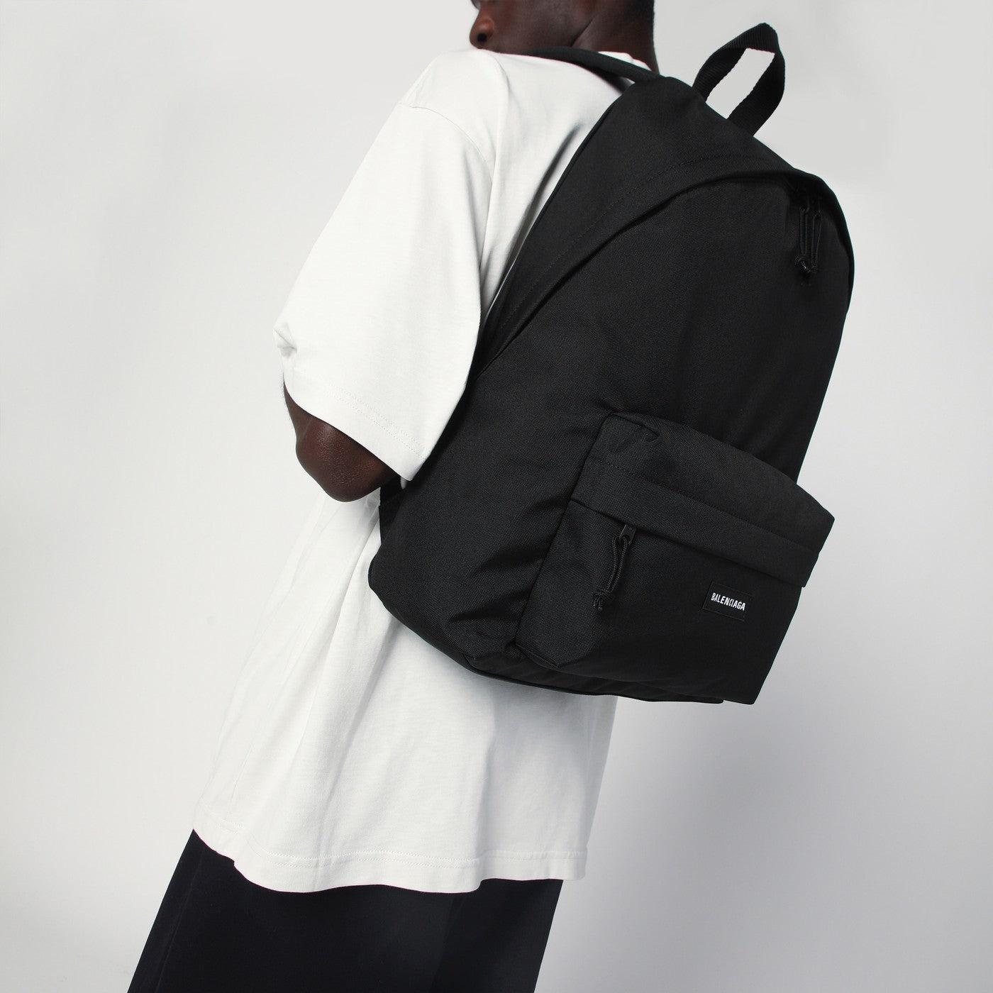 Black Explorer backpack with logo patch