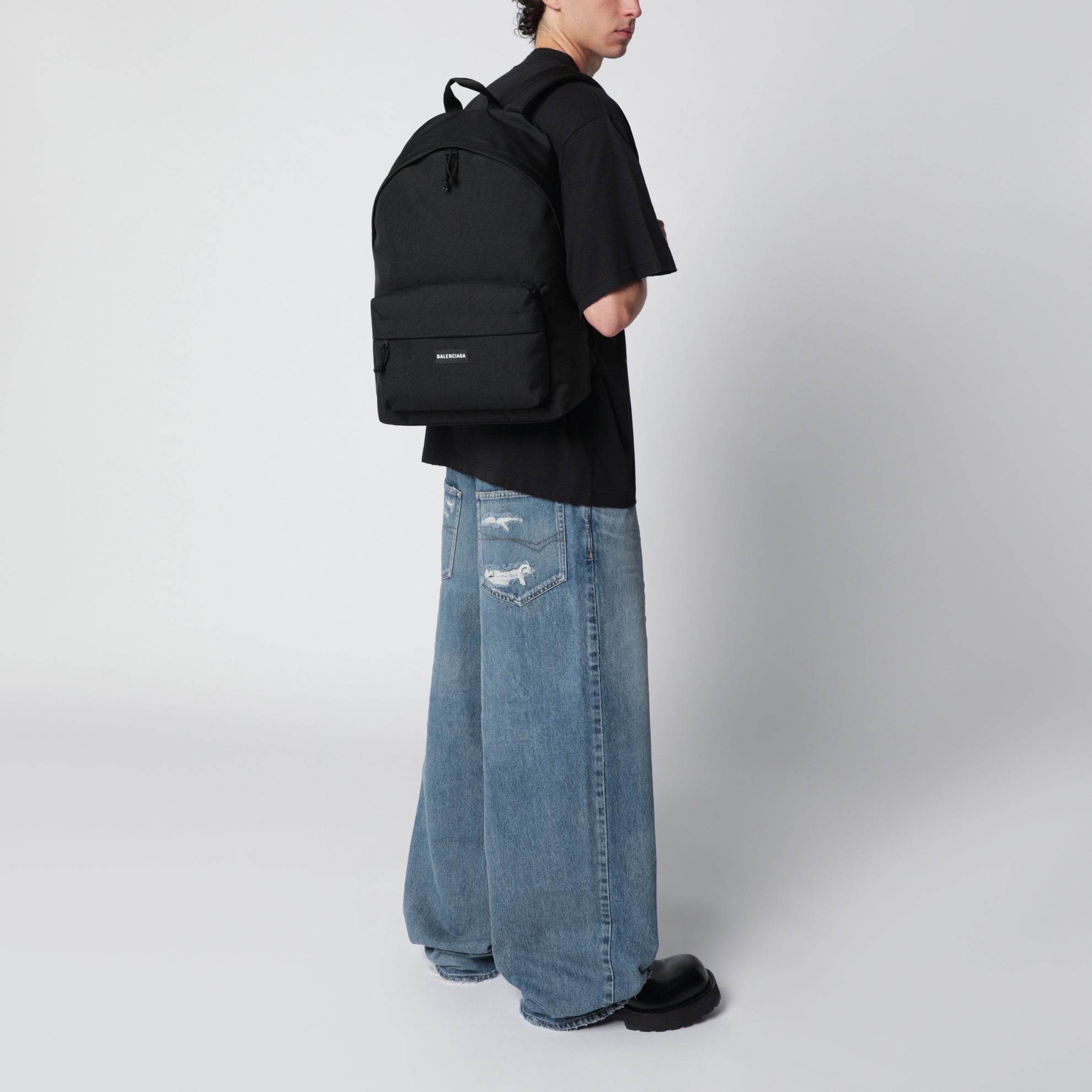 Black Explorer backpack with logo patch