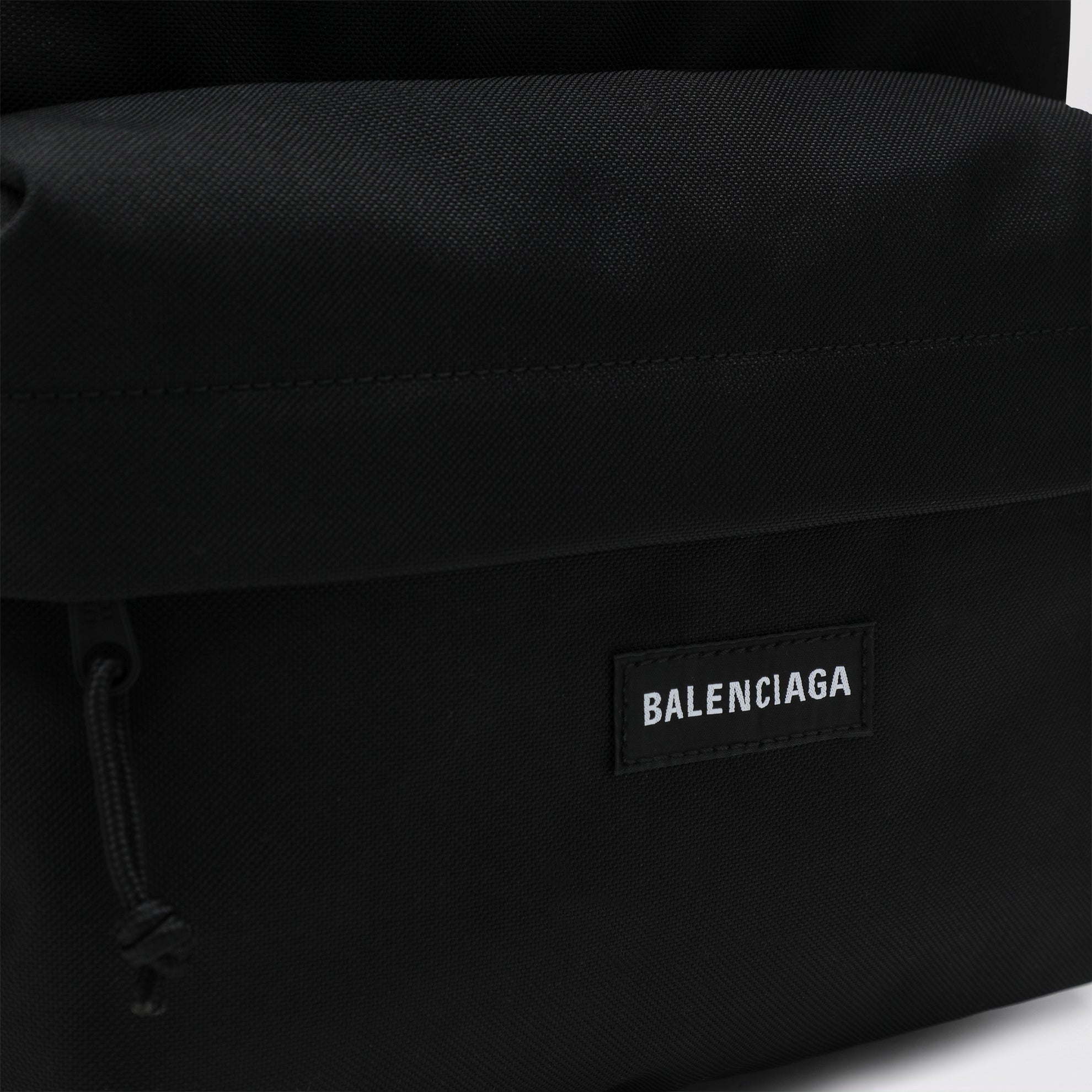 Black Explorer backpack with logo patch