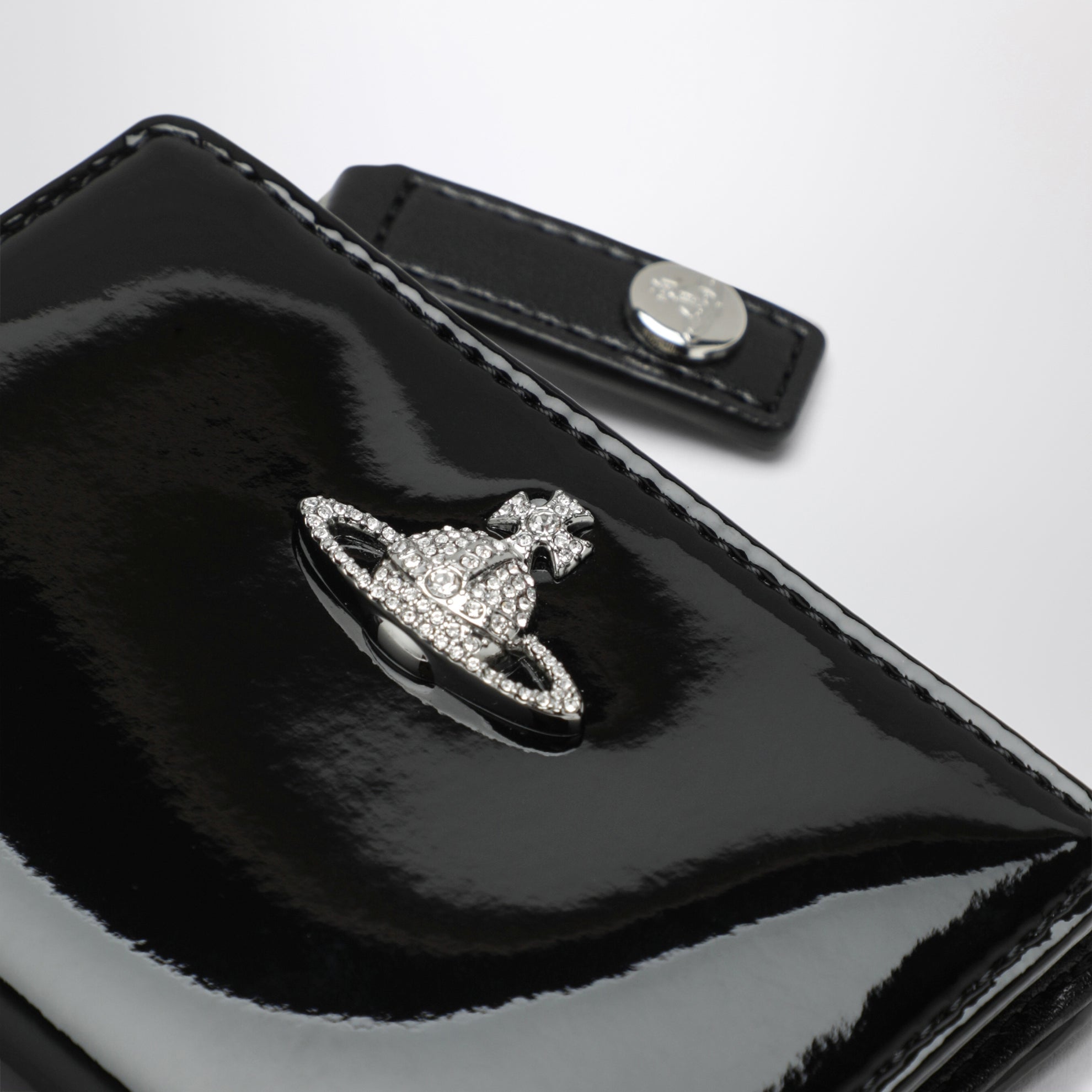 Black Slim Flap Card Holder with crystal-embellished Orb Bas Relief