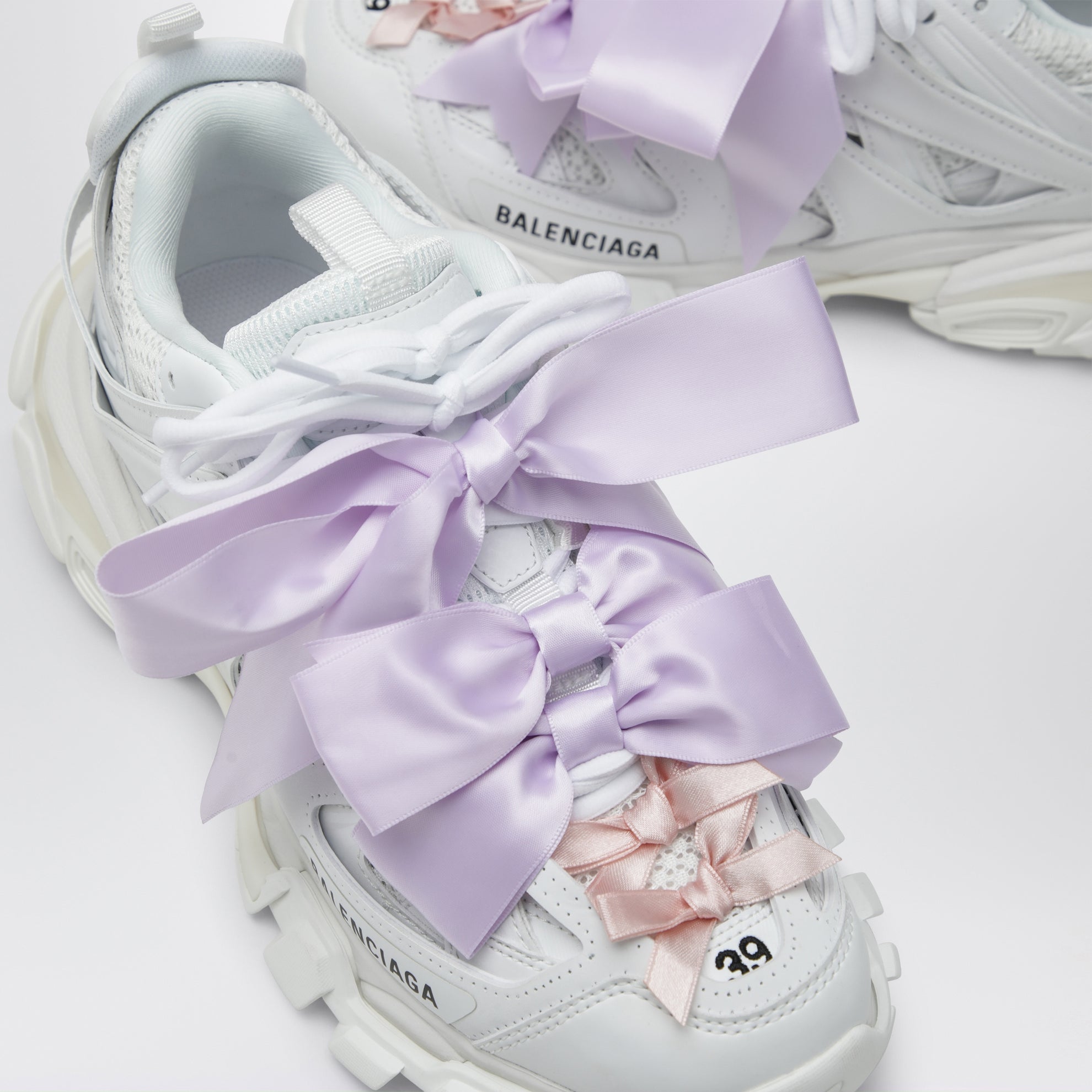 Sneakers Track Bow con fiocchi in poliuretano bianco/rosa