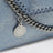 Falabella Kettenportemonnaie in Metallic-Denim