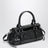 sac à main en cuir noir brillant