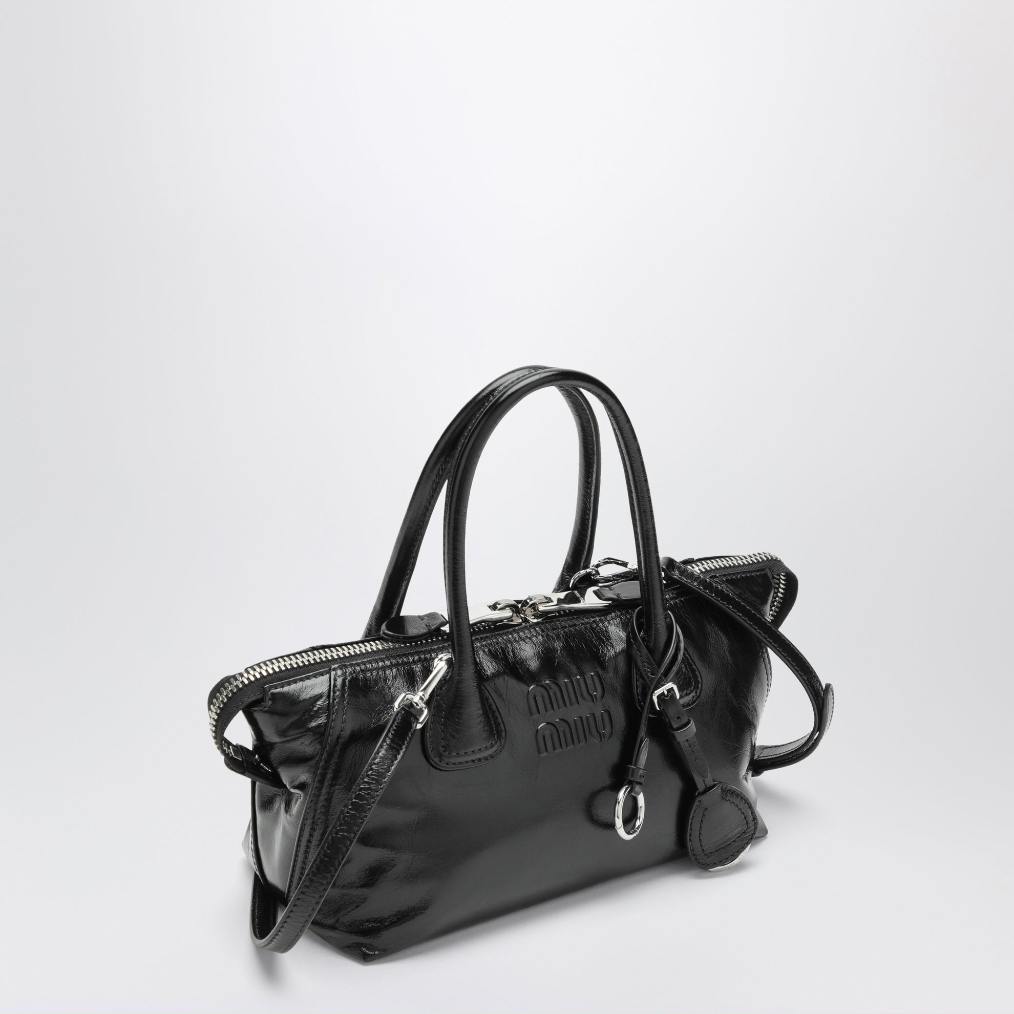 Black glossy leather top-handle bag