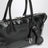 Black glossy leather top-handle bag