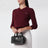 Borsa Arcadie nera in pelle con borchie