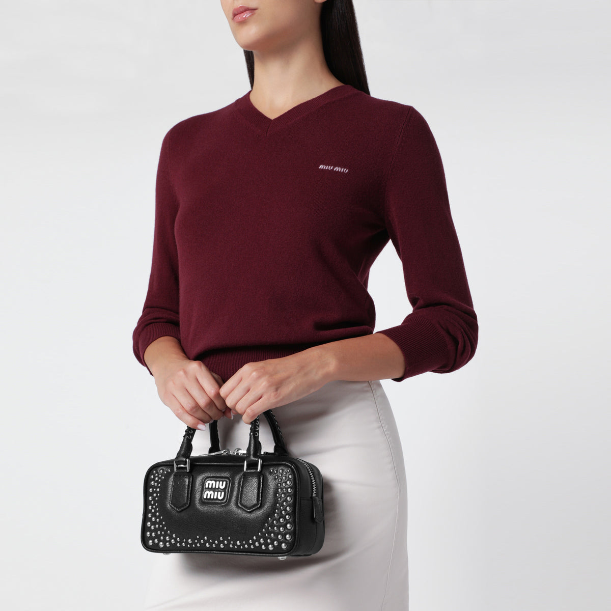 Borsa Arcadie nera in pelle con borchie